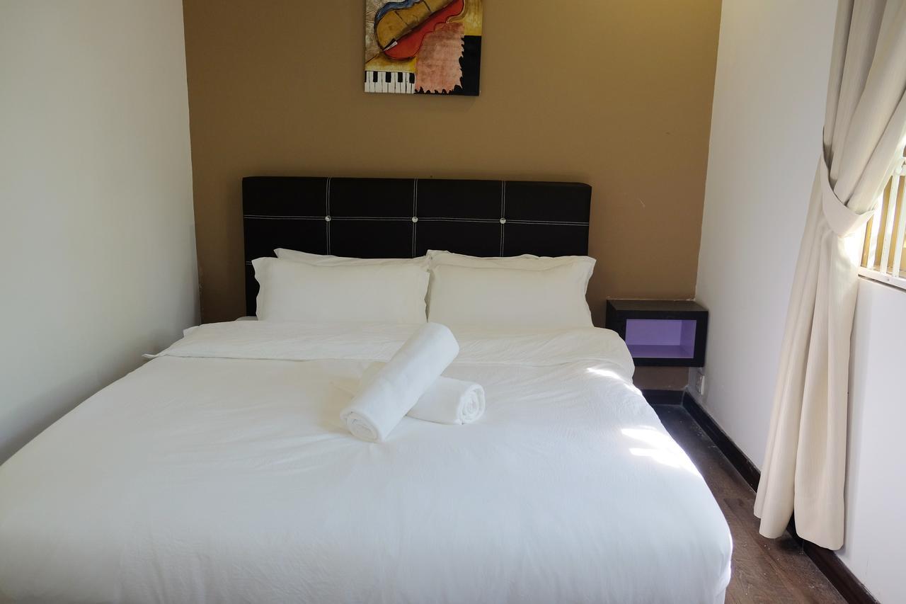 Natol Homestay - London Kuching Eksteriør bilde